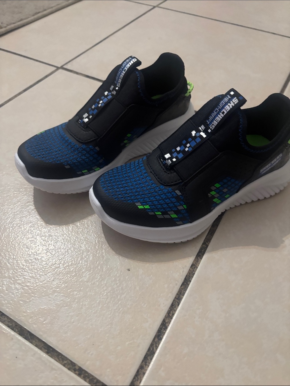 Skechers Navy Blue and Black Slip-On Kids Sneakers with Green Accents